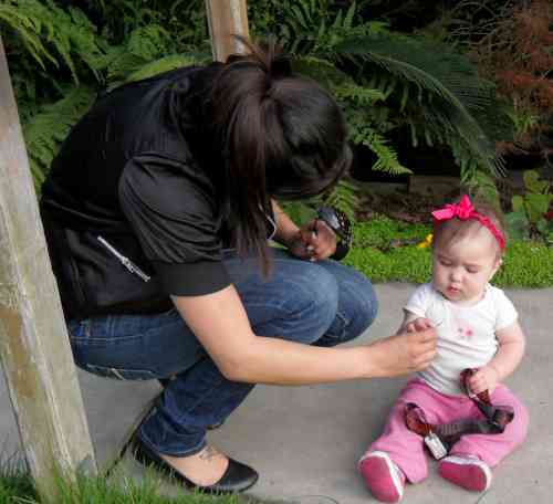 Mom's checking my hand for dirt