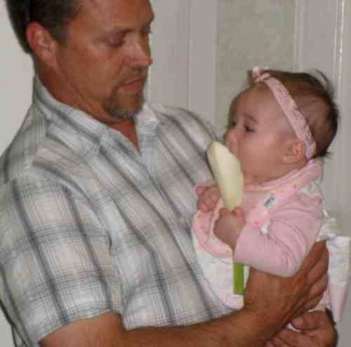 With Grandpa, sucking on a fennel lollipop one-handed