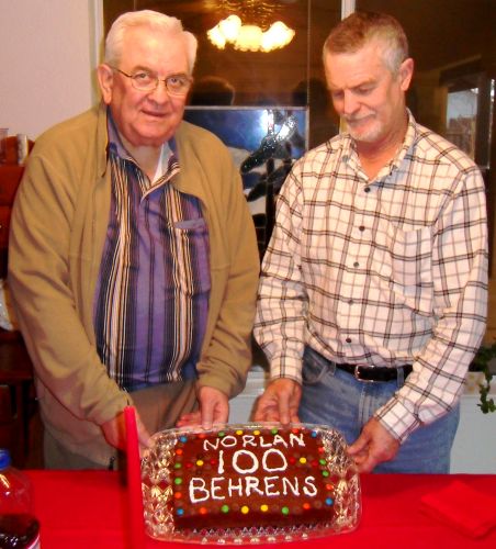 My Great Grandpa & Great Uncle Dave holding Great Great Grandpa's cake