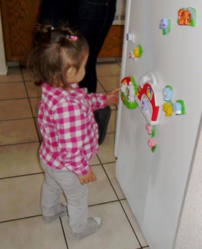 My game on the fridge to sing & dance to the alphabet