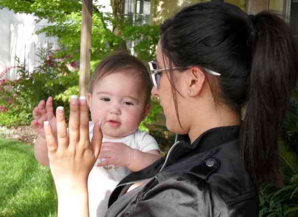 High fiving Mom